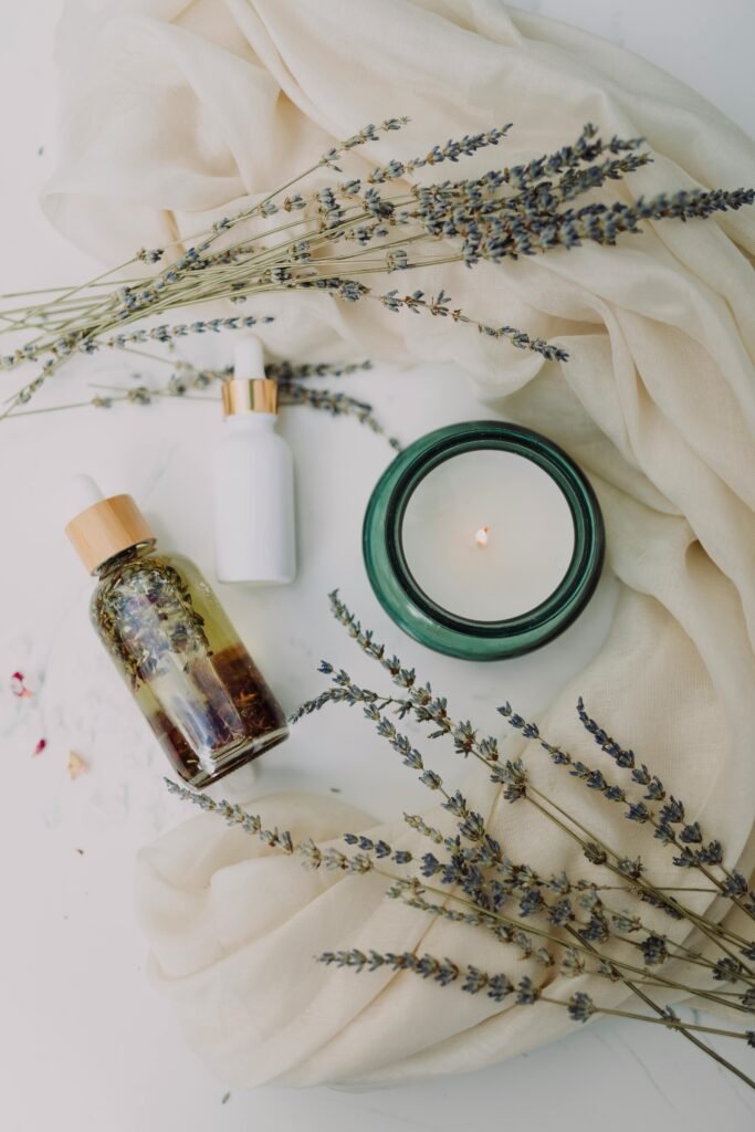 pexels-photo-6724357-6724357 A calming flat lay of spa essentials featuring lavender and candles for relaxation.